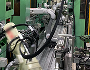 加工機への投入・取り出し