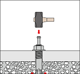 金属系アンカー（芯棒打込み式） アンカーを挿入し、芯棒が本体の頂部に接するまで、ハンマーで打ち込む。